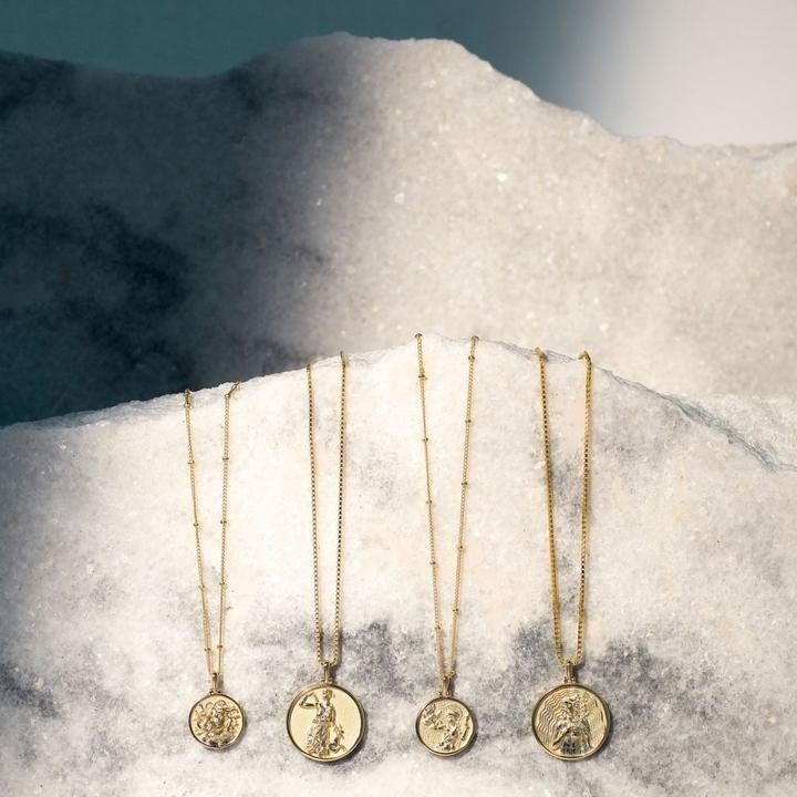 the gold coin necklaces 