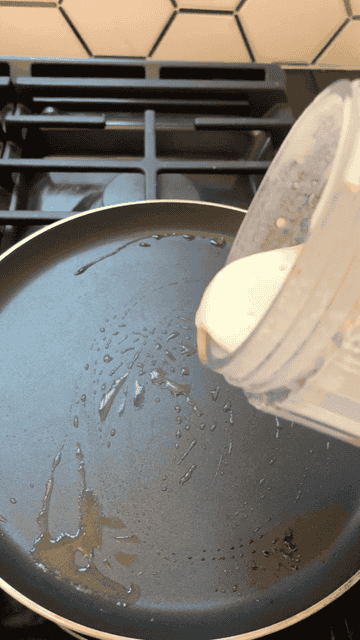 A gif of me pouring the batter into a crepe pan