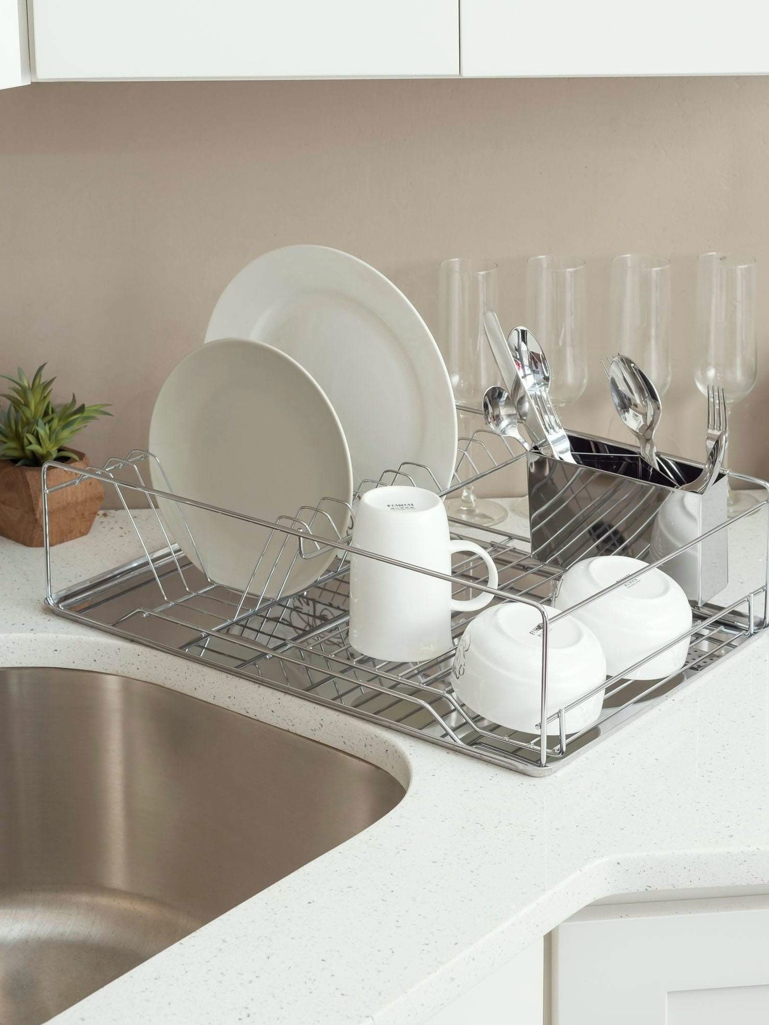 Chrome Plated Steel Dish Rack with Tray placed on counter near sink