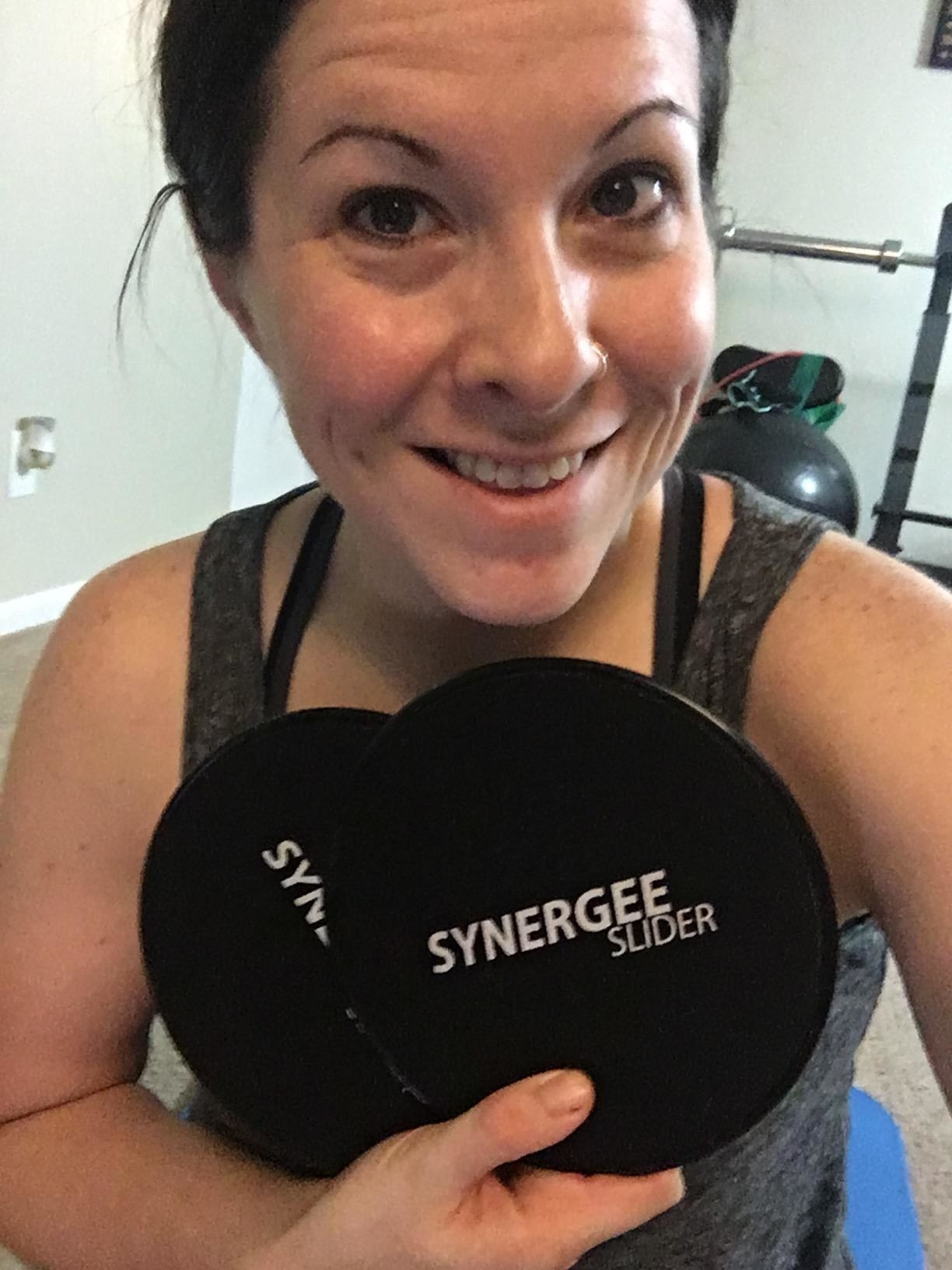 reviewer holds core sliders in hands