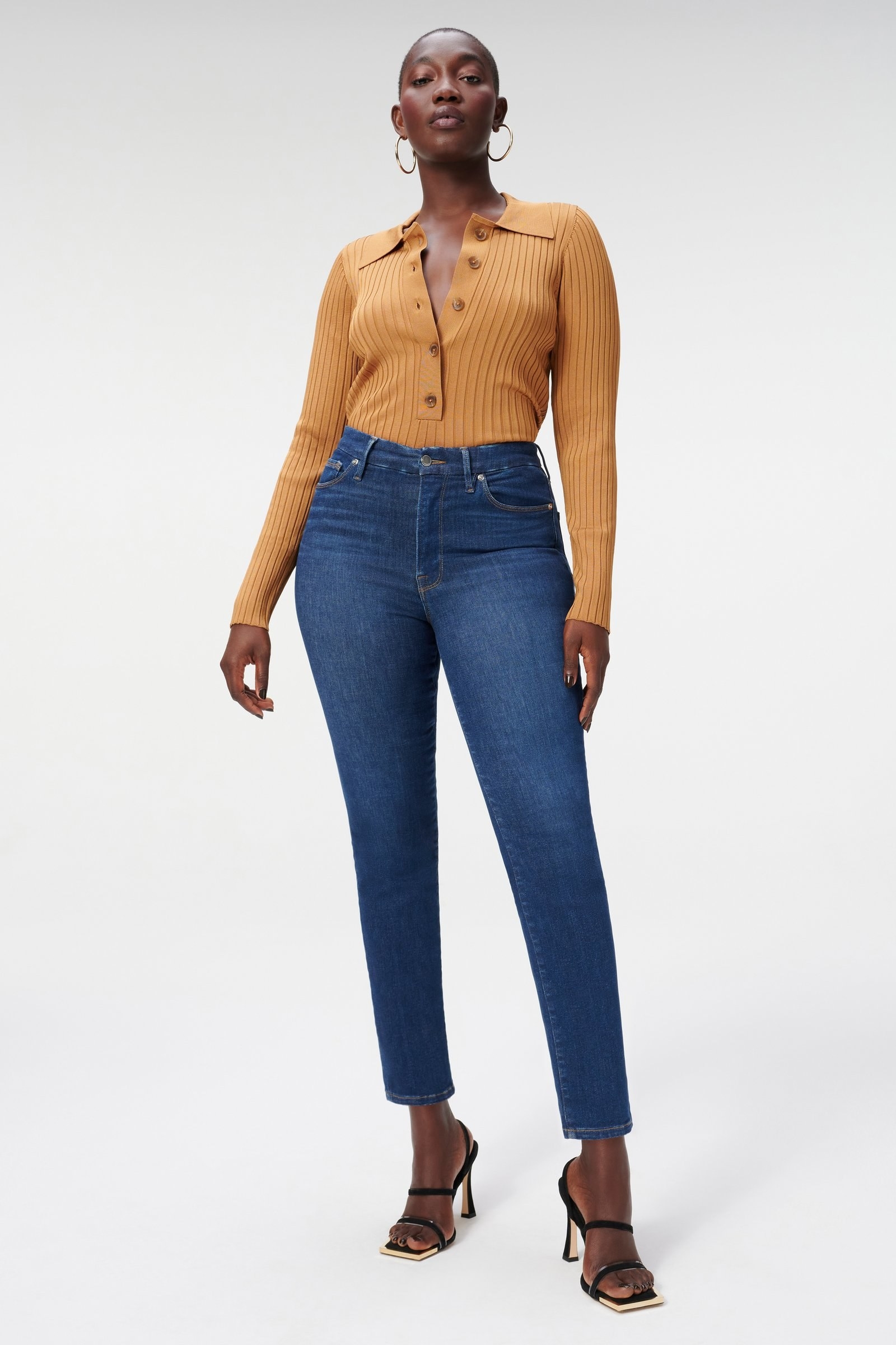 a model in blue skinny jeans