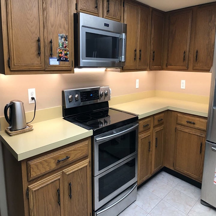 Reviewer's kitchen before using backsplash stickers