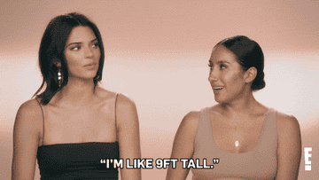 Kendall Jenner and Jen Atkins talking, caption &quot;I&#x27;m like 9 feet tall&quot;