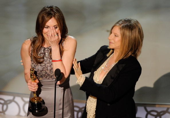 Barbara Streisand presenting Kathryn Bigelow with an award