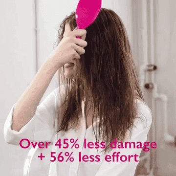 A gif of a model brushing through damp hair, with text &quot;over 45% less damage