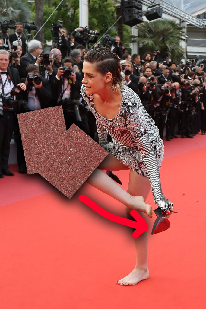 Kristen Stewart taking off her uncomfortable shoes at Cannes