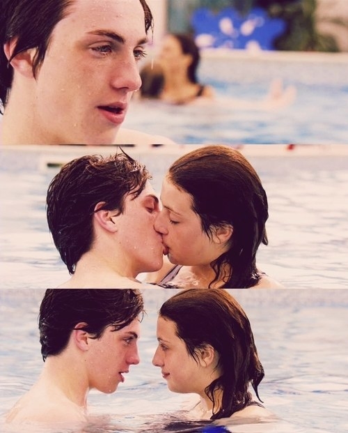 Robbie and Georgia kissing in the pool