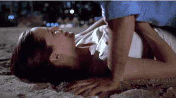 Matty kissing Jenna in the sand