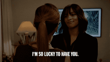 A gif of a person telling another person &quot;I&#x27;m so lucky to have you&quot;