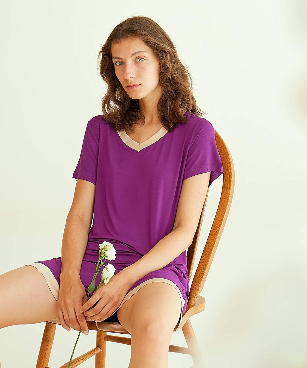 model wearing purple pajamas