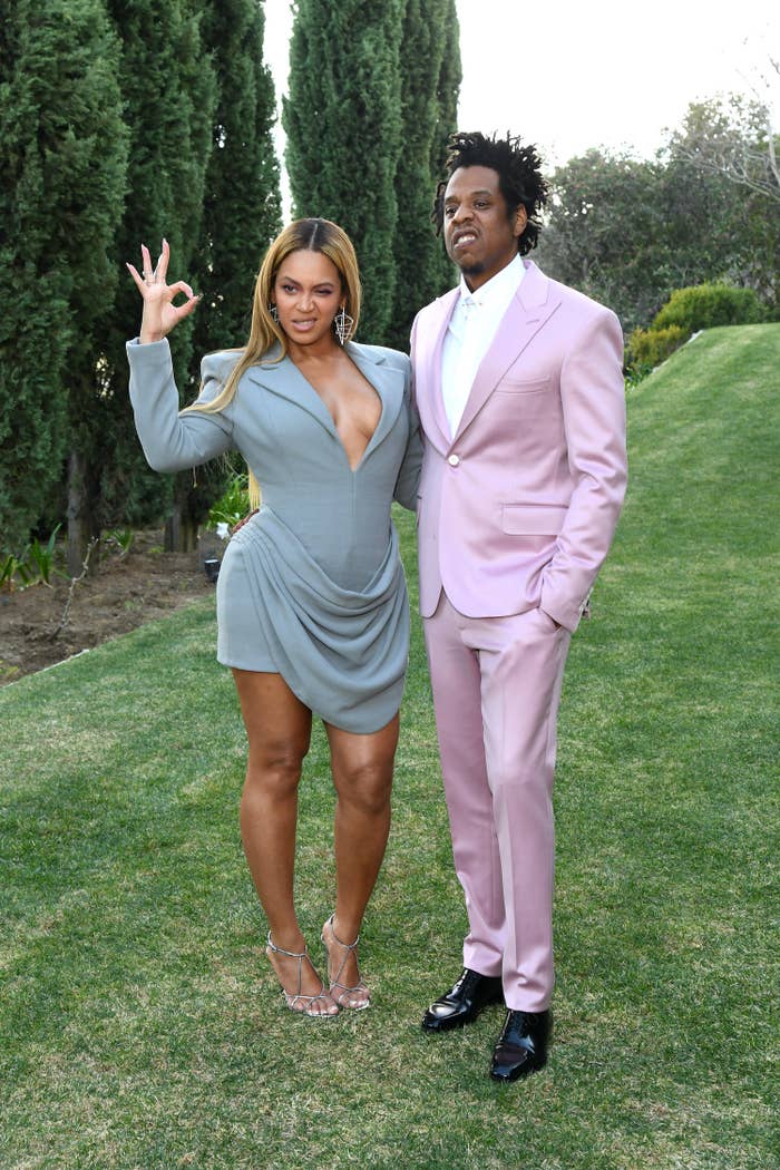 Beyoncé and Jay-Z pose for a photo as Beyoncé puts up an &quot;OK&quot; sign