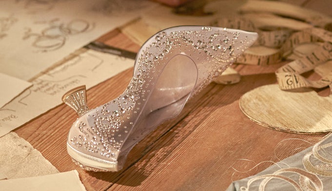 Close up of the glass slipper sitting on a table