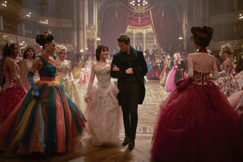 Royal ball with many people in lavish ball gowns, and cinderella and the prince in walking through the crowd