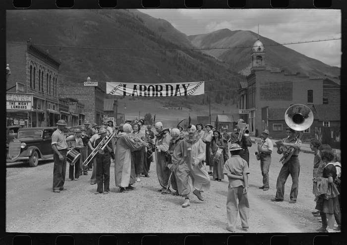 Clowns and a band perform at a labor day celebration in Colorado, 1940