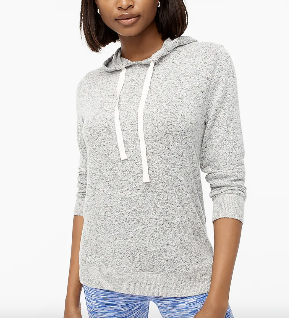 model wearing the gray hoodie