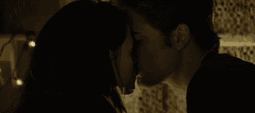 Edward kissing Bella in her bedroom