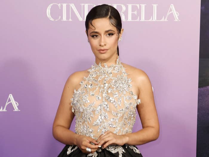 Camila wears a diamond encrusted halter top to the premiere