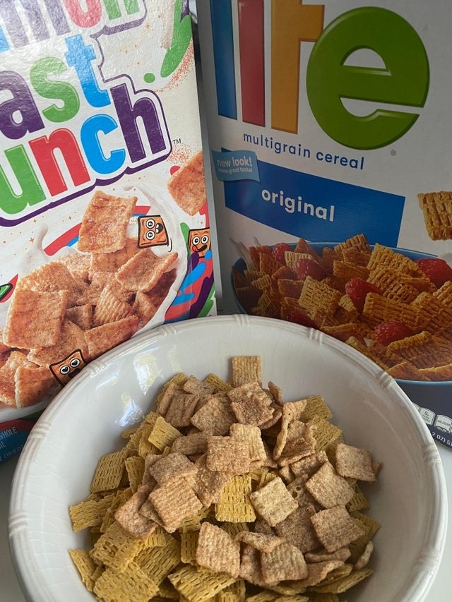 Cinnamon Toast Crunch and Life cereal together in one bowl