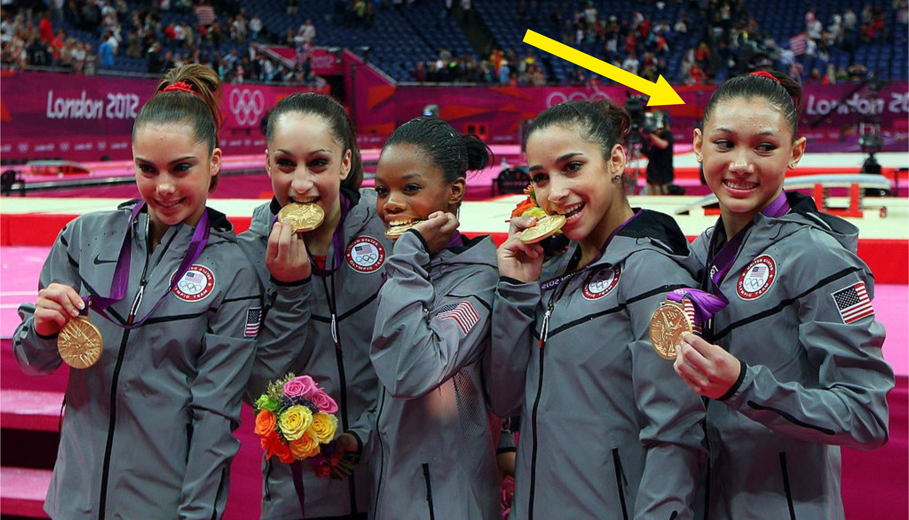Kyla showing off her gold medal with the rest of her teammates