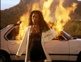 Angela&#x27;s character in the film Waiting to Exhale walking away from a car that she just set on fire