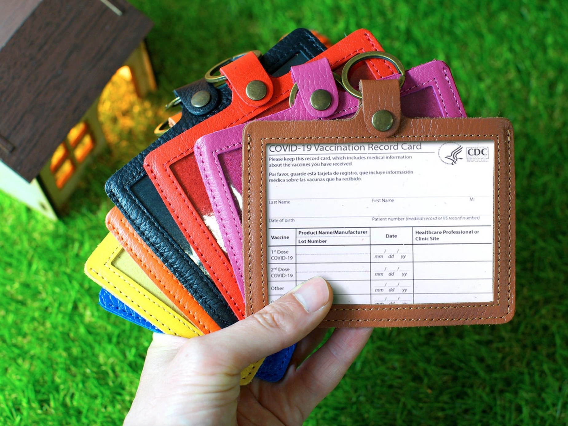 The leather vaccine card holder with key ring in different colors