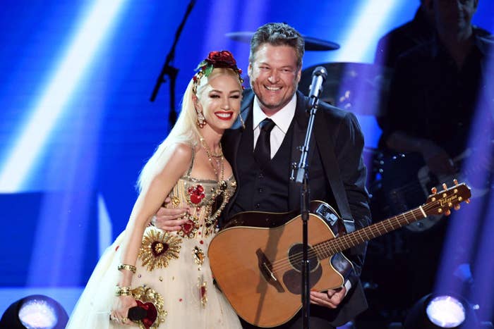 Gwen and Blake on stage after a performance