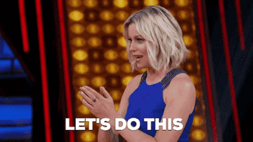 elizabeth banks hosting a game show and saying, &quot;let&#x27;s do this&quot;