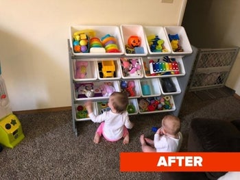 Reviewer's after photo showing a clean room with toys stored in the organizer