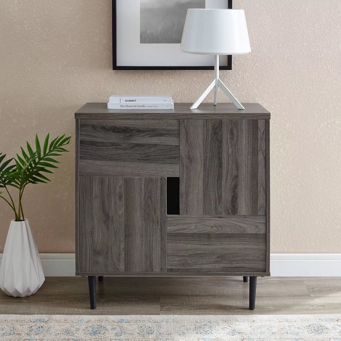 A slate gray accent cabinet.