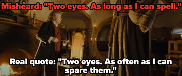 Bilbo looks up at Gandalf