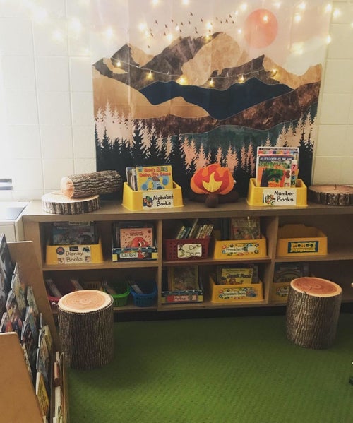 Reviewer's photo showing two tree trunk storage stools in a room