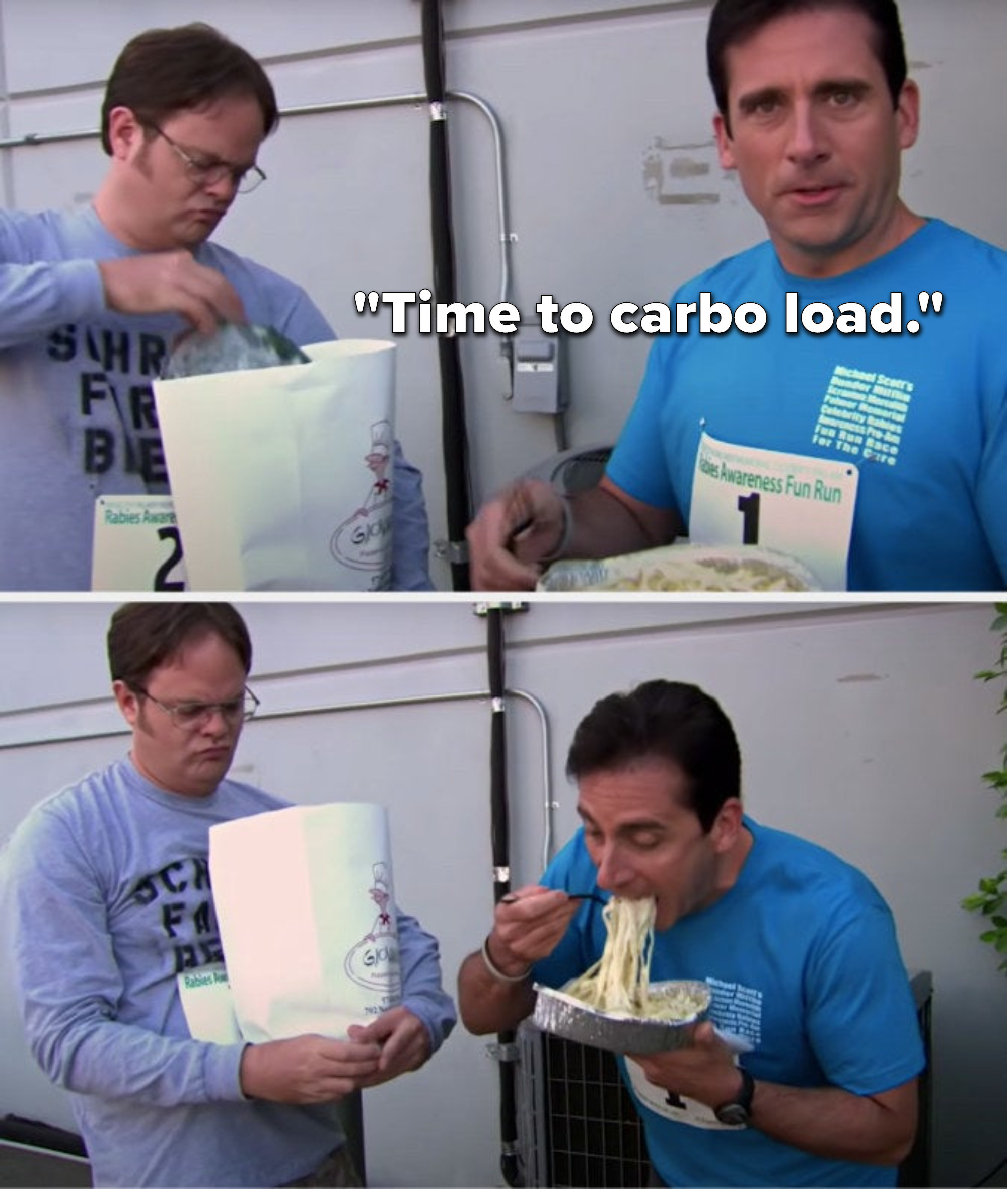 Michael says, Time to carbo load and takes a huge bite of his full fettuccine alfredo meal