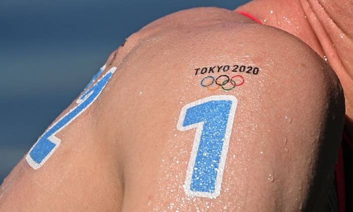 The Olympic rings pictured on the shoulder of Germany&#x27;s Florian Wellbrock after he won the men&#x27;s 10km marathon swimming event