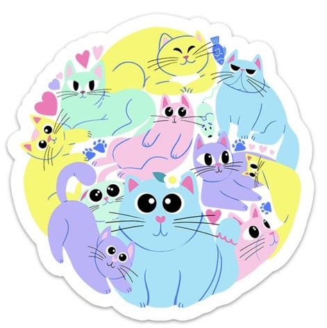 The round sticker with pink, blue, purple, yellow, and green cats on it.