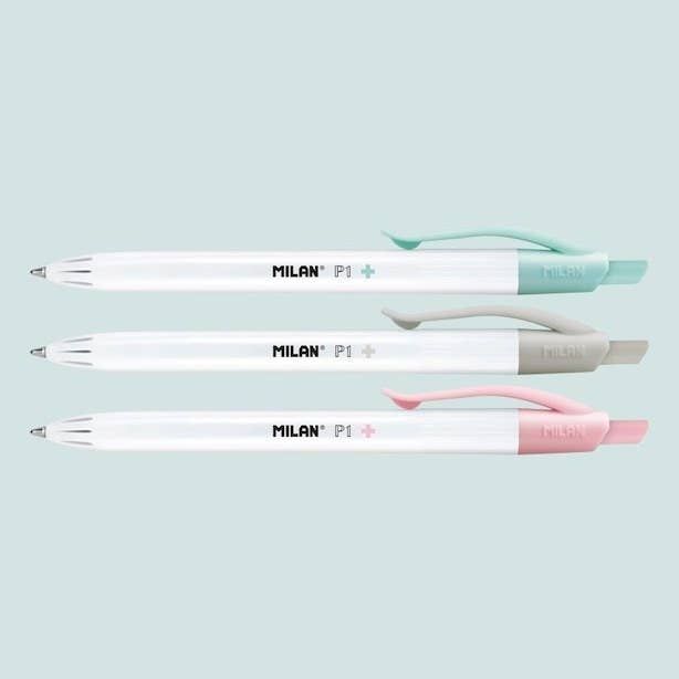 three pens on a blue background