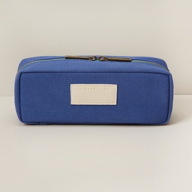 a pencil case with two zippers and a spot to write your name
