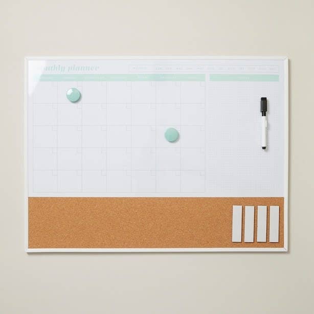 the monthly dry erase board with two magnets, cork board, and dry erase marker