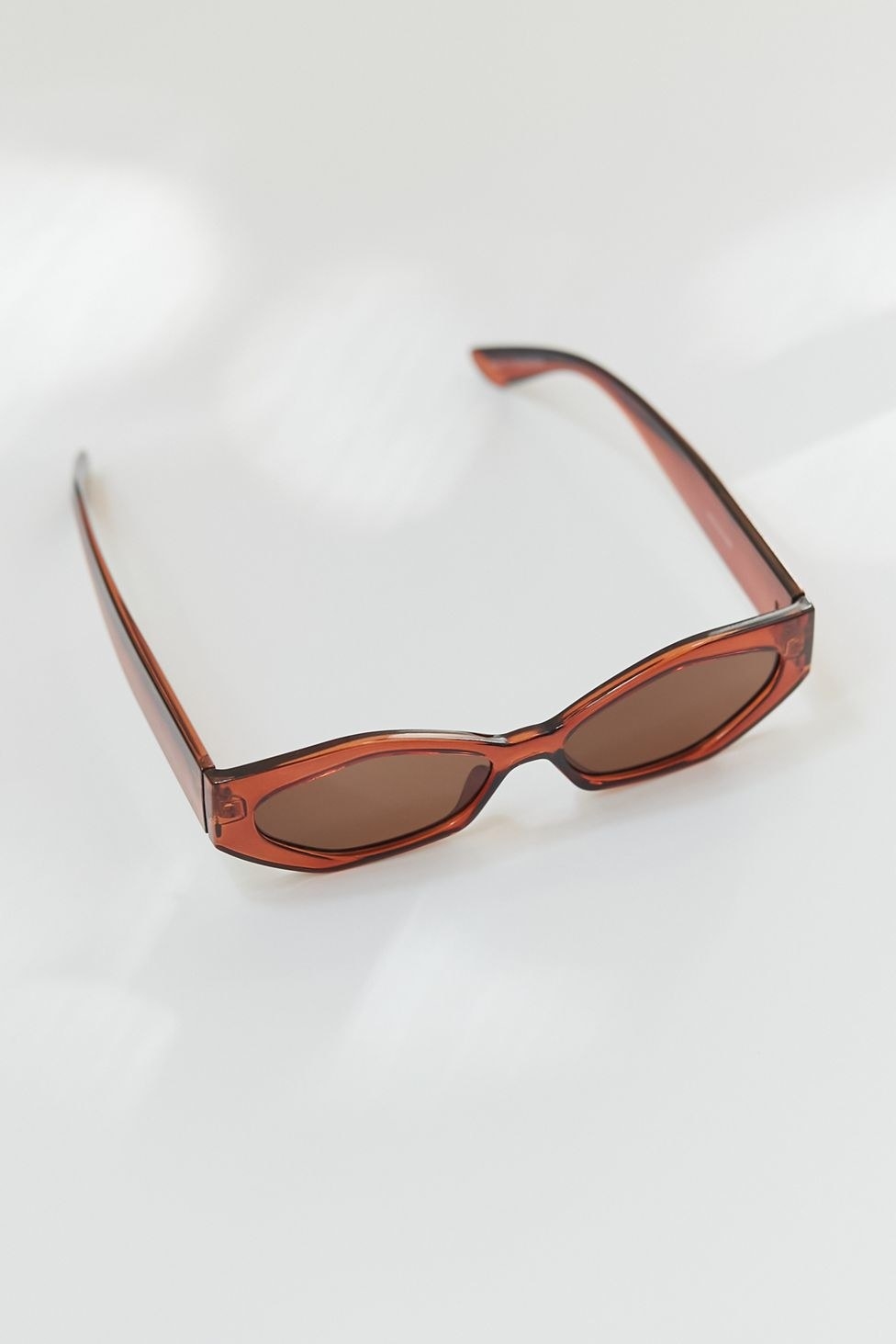 red oval acetate sunglasses
