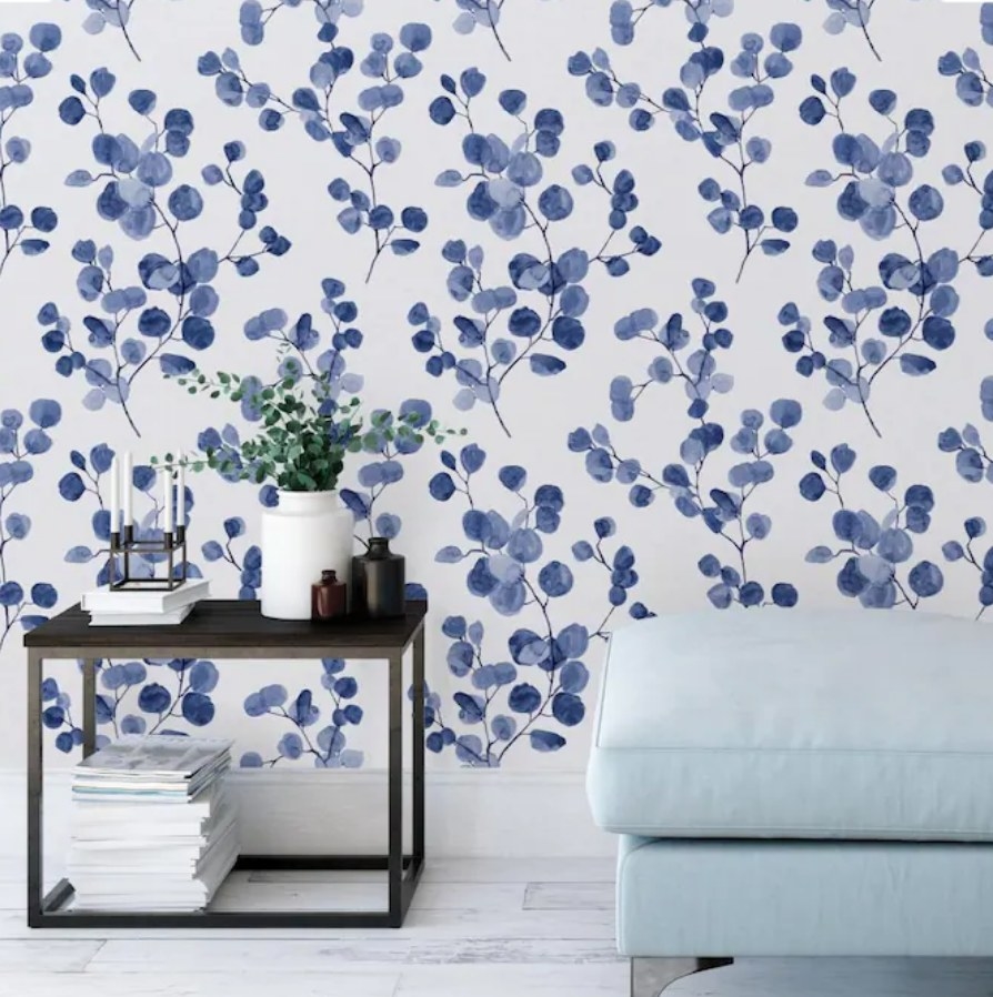 Blue floral wallpaper in living room