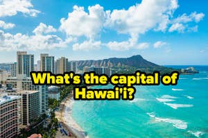Hawaiian beach with buildings and the ocean, and the question, "What's the capital of Hawai'i?"
