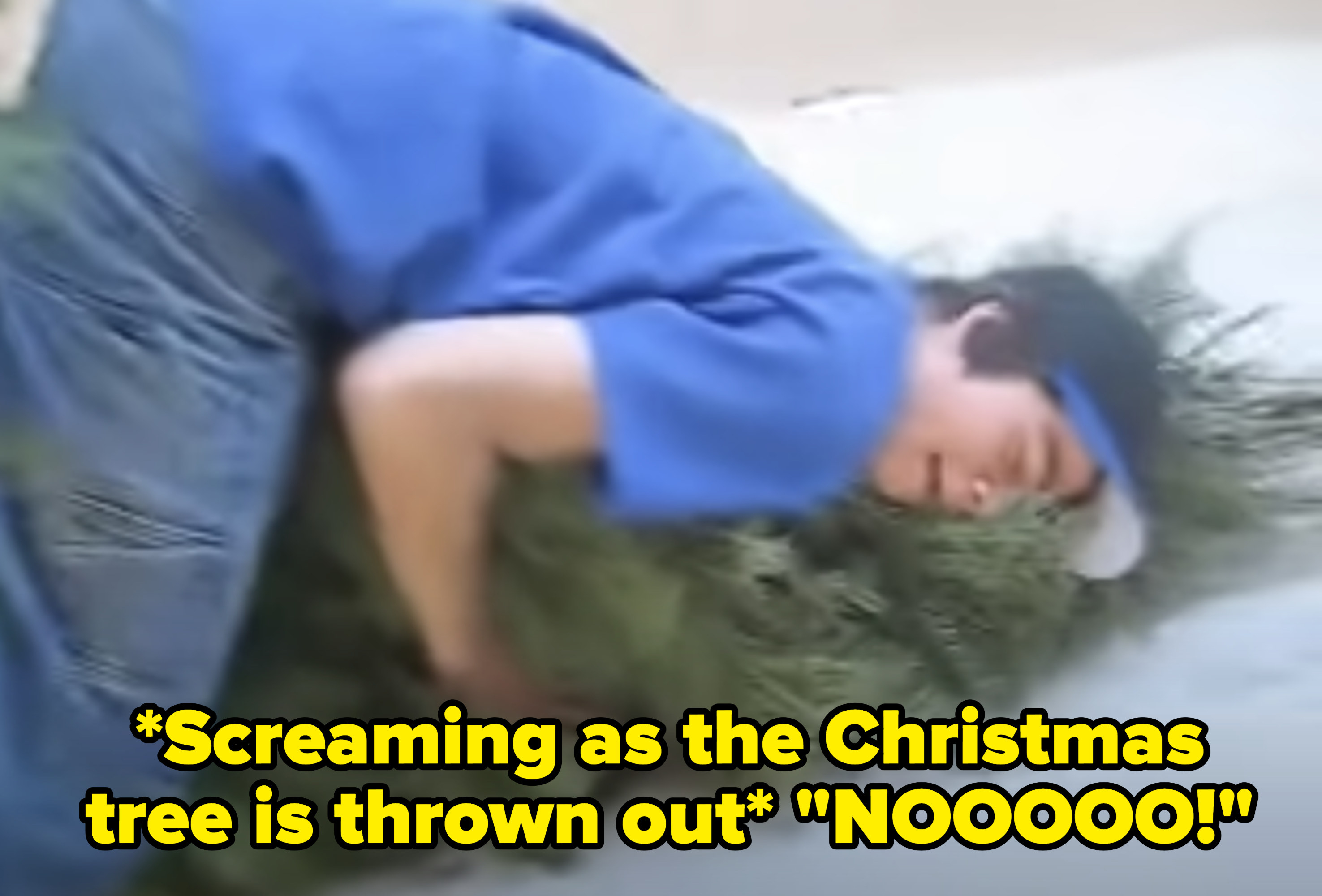 Dylan screaming &quot;NOOO!&quot; and hanging onto a Christmas tree that&#x27;s being thrown out