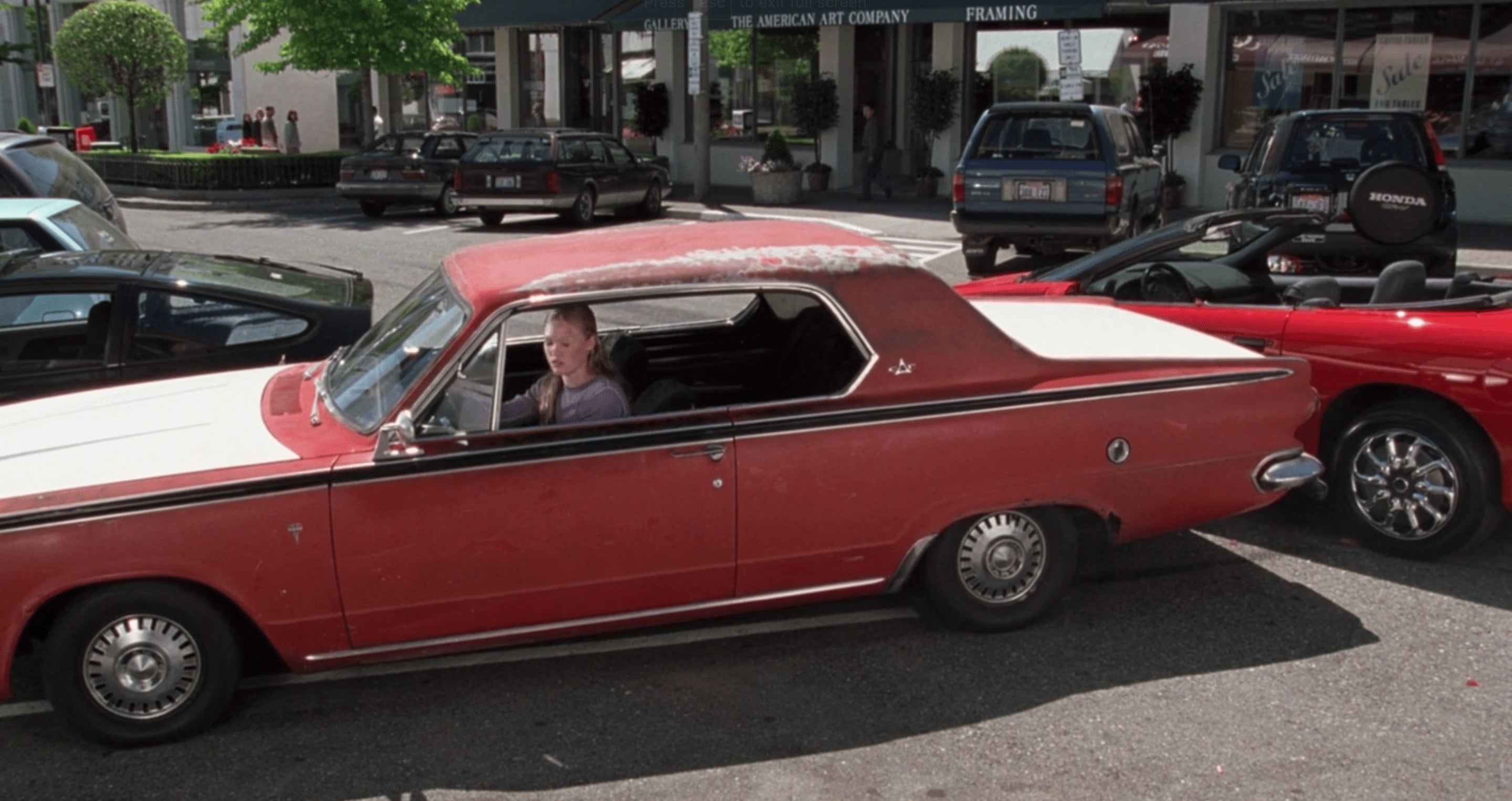 Kat backs into Patrick's car after he parks deliberately behind her
