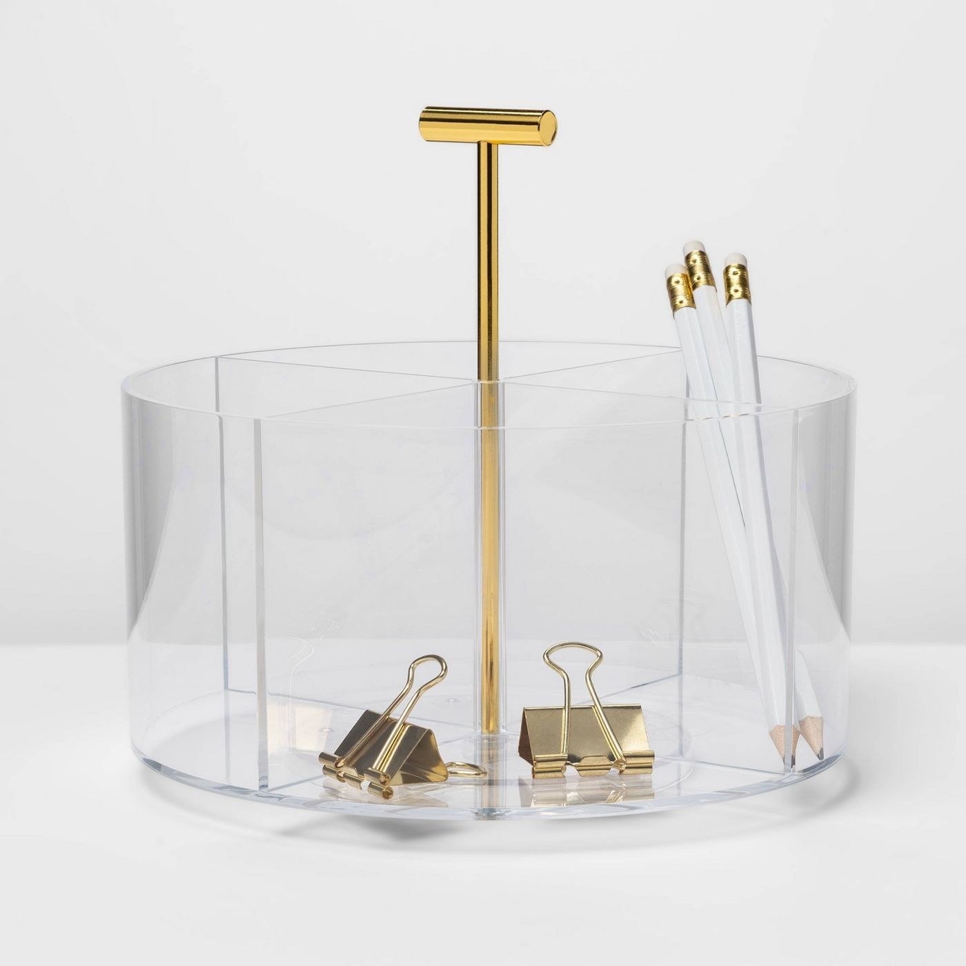 round acrylic desktop organizer with four compartments and gold tone handle