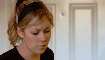 Woman looks confused and shocked