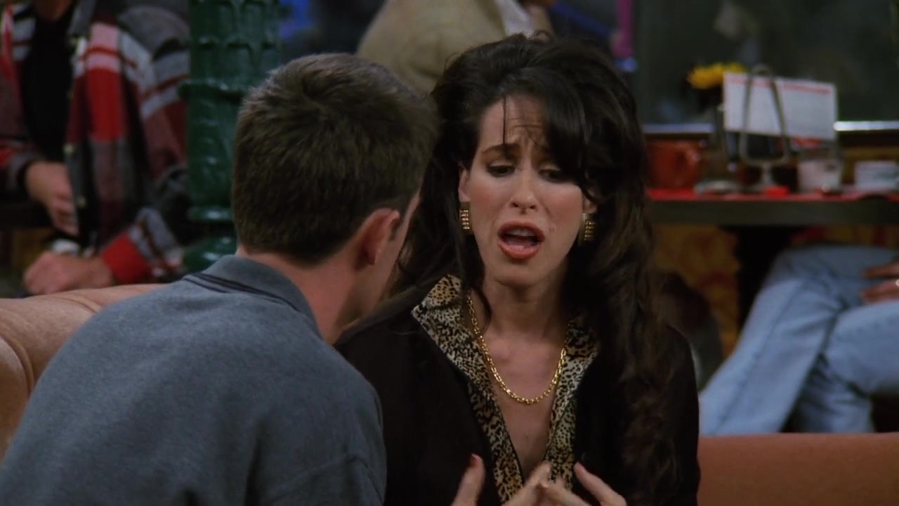 Janice talking to Chandler in the coffee shop