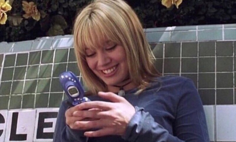 Hillary Duff on a flip phone.