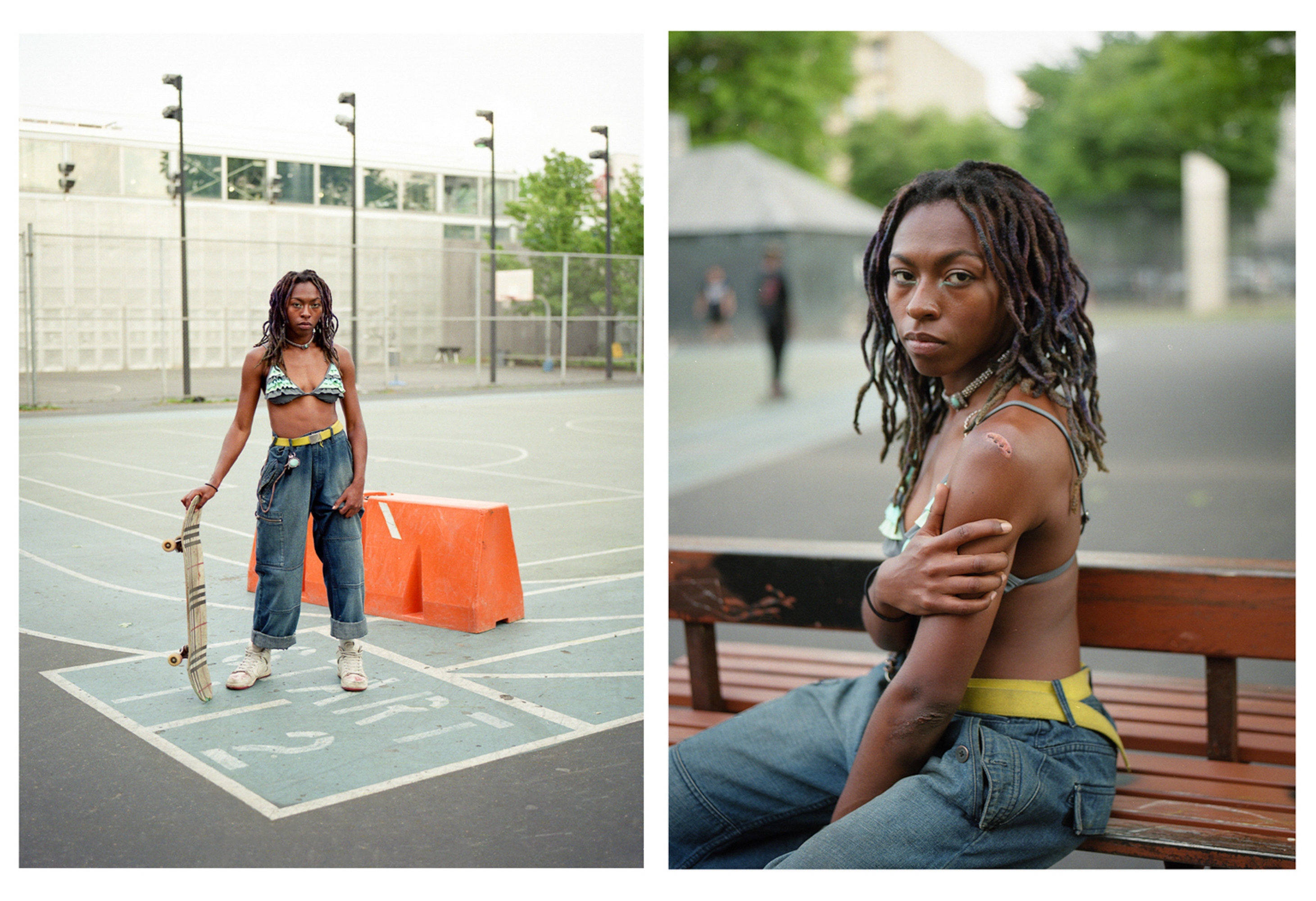 A woman with a skateboard poses for a portrait on a playground