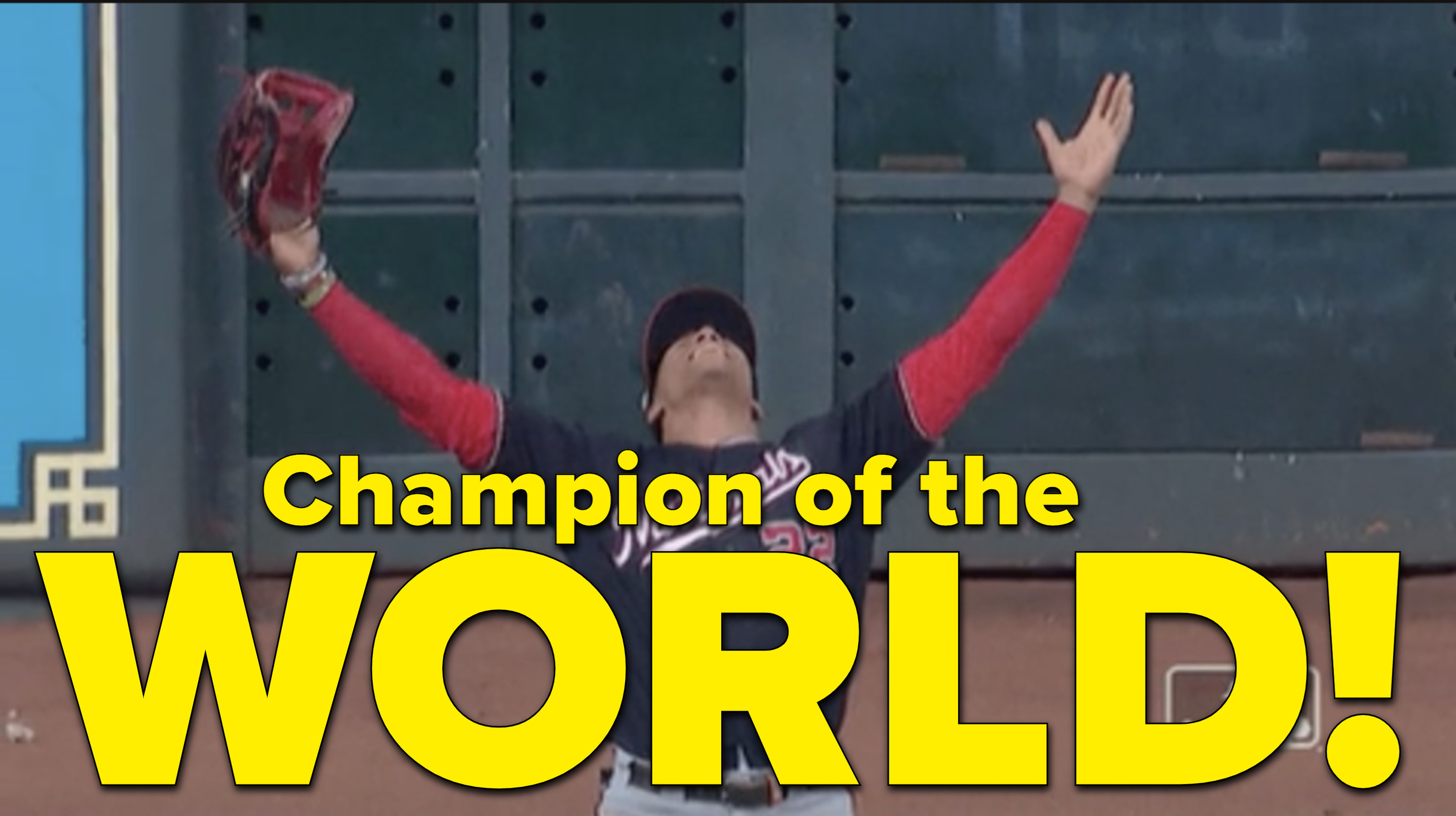 A Nationals players raises his hands in victory, the text reads &quot;champion of the world&quot;