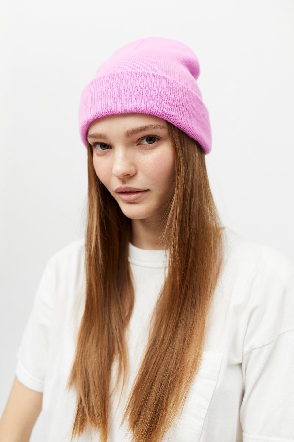 model in pink beanie
