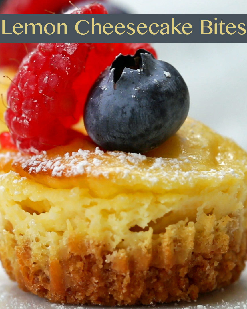 Lemon cake with sprinkled sugar, blueberries and raspberries on top